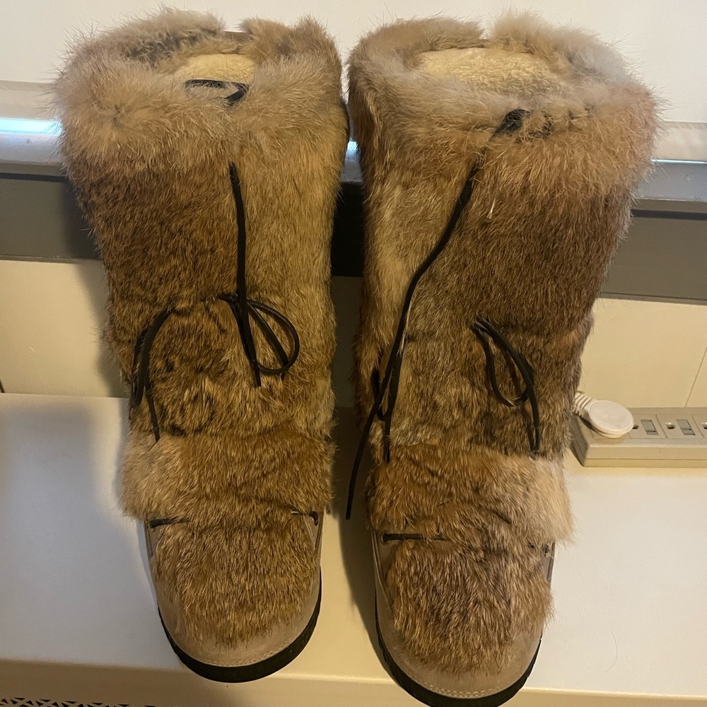 WORN ONCE REAL FUR BOOTS. PERFECT FOR WINTER. COZY AND FASHIONABLE